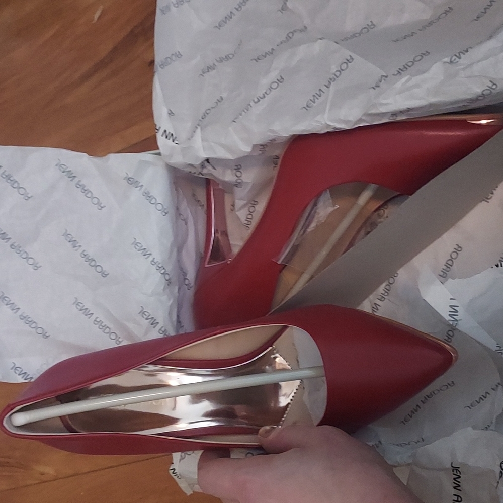 Deep red pump with gold accents